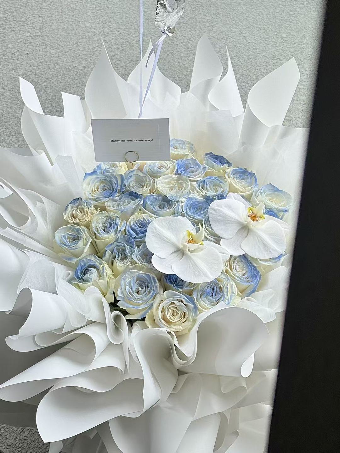 33 Light Blue Roses with Orchids