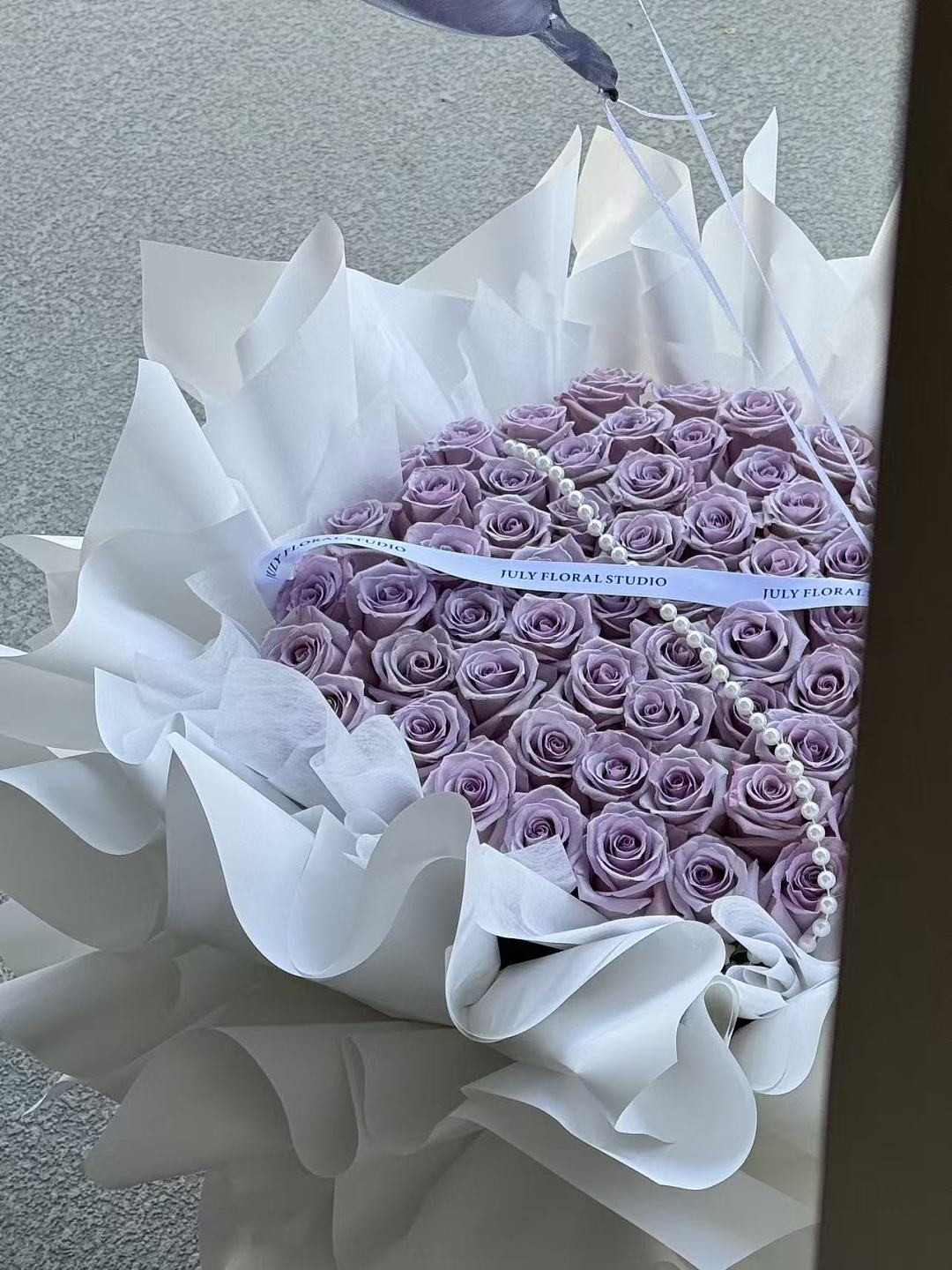 52 Purple Roses
