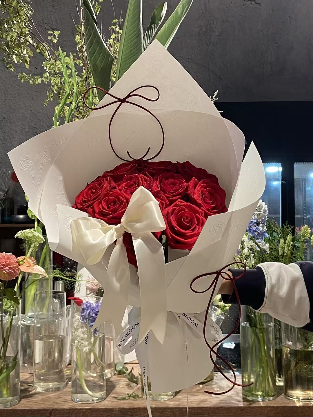 Red roses in simple wrapping